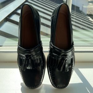 G.H. Bass & Co. Black Leather Penny Loafers With a Tassel Attachment